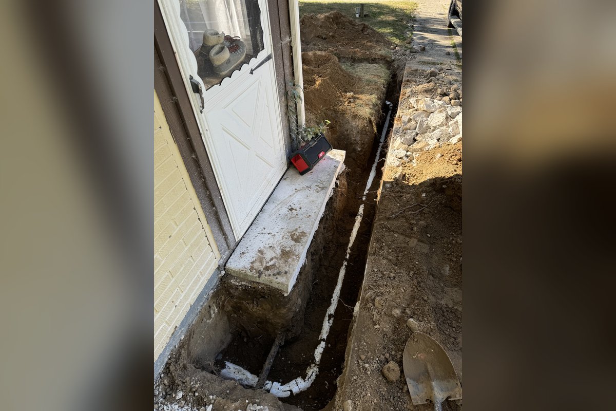 Sewer line trench excavation by Alliance Plumbing in the Greater Kalamazoo area