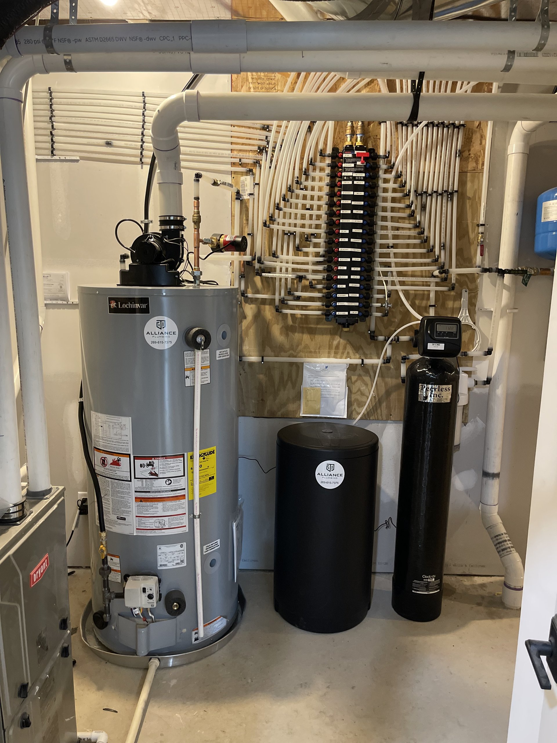 Whole-home water softener and PEX manifold install by Alliance Plumbing in Kalamazoo